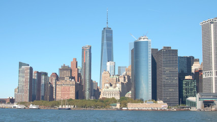 Fototapeta na wymiar CLOSE UP: Glassy skyscrapers and luxury waterfront condos in Lower Manhattan