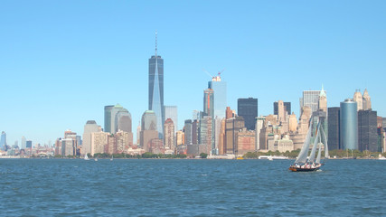 Fototapeta na wymiar Tourists on scenic New York City sightseeing boat tour on beautiful sailboat