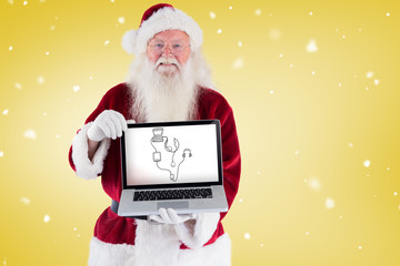 Santa Claus presents a laptop against yellow vignette