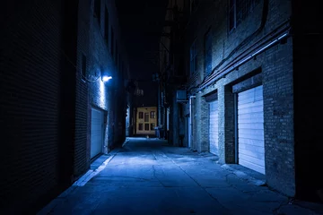 Door stickers Narrow Alley Dark and eerie urban city alley at night