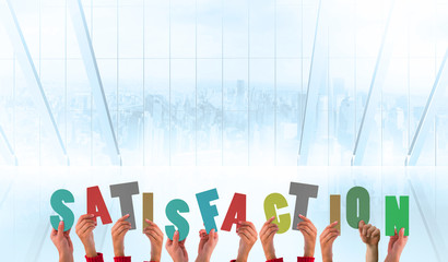 Hands showing satisfaction against white room with large window overlooking city