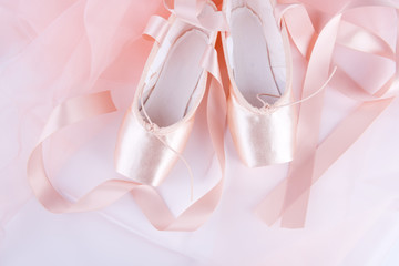 Top of ballet shoes with pink ballet costume