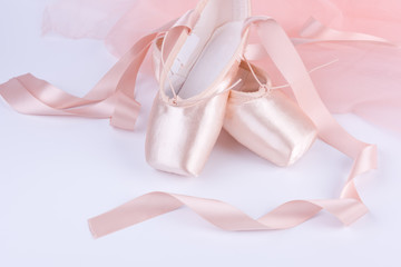 Closeup of ballet shoes with pink ballet costume - obrazy, fototapety, plakaty