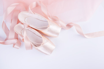 Top of ballet shoes with pink ballet costume