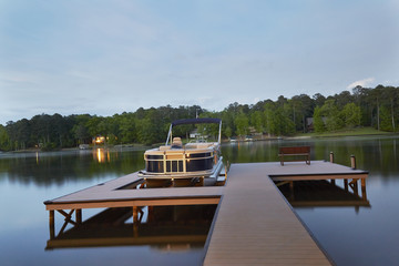 My recreation boat on serene lake at sunset in Georgia