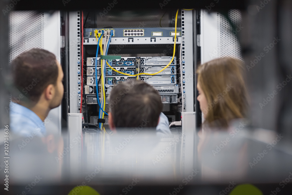 Poster Technicians viewing a server