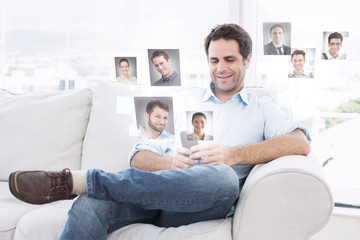 Fototapeta premium Cheerful man sitting on the couch using his smartphone against profile pictures