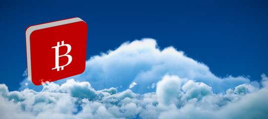 Bitcoin symbol against low angle view of white clouds against sky