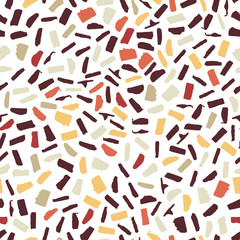 Seamless pattern in the style of terrazzo. In brown, red, yellow, white colors. Vector illustration.