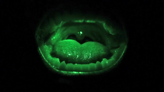 Ridiculous funny illuminated mouth laughing hard at a crazy joke.