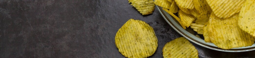 Banner of Potato chips in the glass bowl