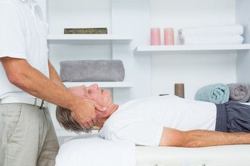 Obraz premium Man receiving neck massage 