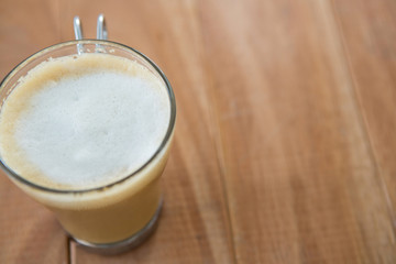 Coffee served in glass cup