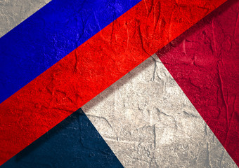 Image relative to politic relationships between Russia and France. Russian and France grunge style flags.