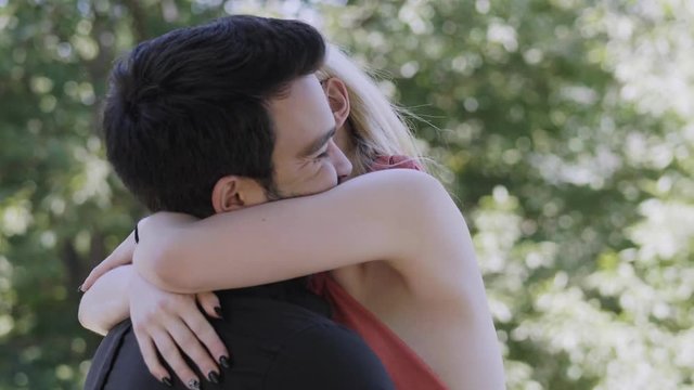 passionate embrace between lovers in the park