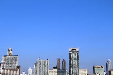 Bangkok cityscape / Line of modern high buildings under clear blue sky