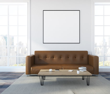 White wall living room, brown sofa, poster