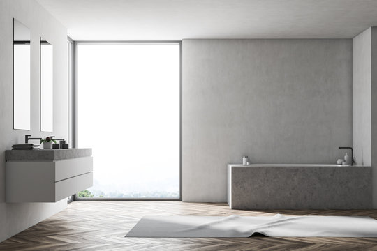 White bathroom interior, gray tub