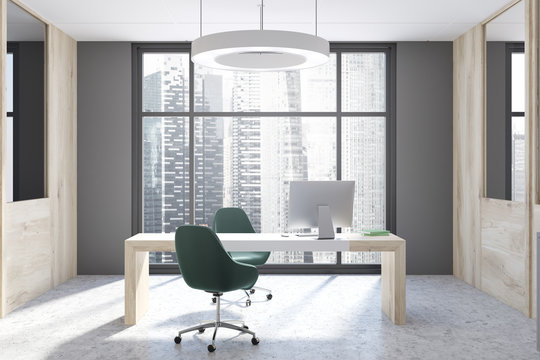 Gray and wooden CEO office interior