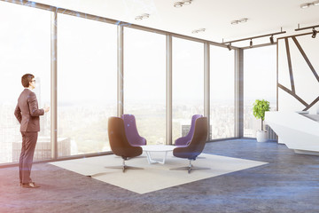 Purple armchair panoramic waiting room businessman