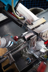 Metallurgy heavy industry. Factory for production metal parts. Close up shot of workers hand.