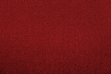 Obraz premium Rough red fabric texture for background