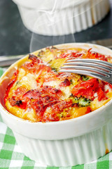 small quiche lorraine in green towel