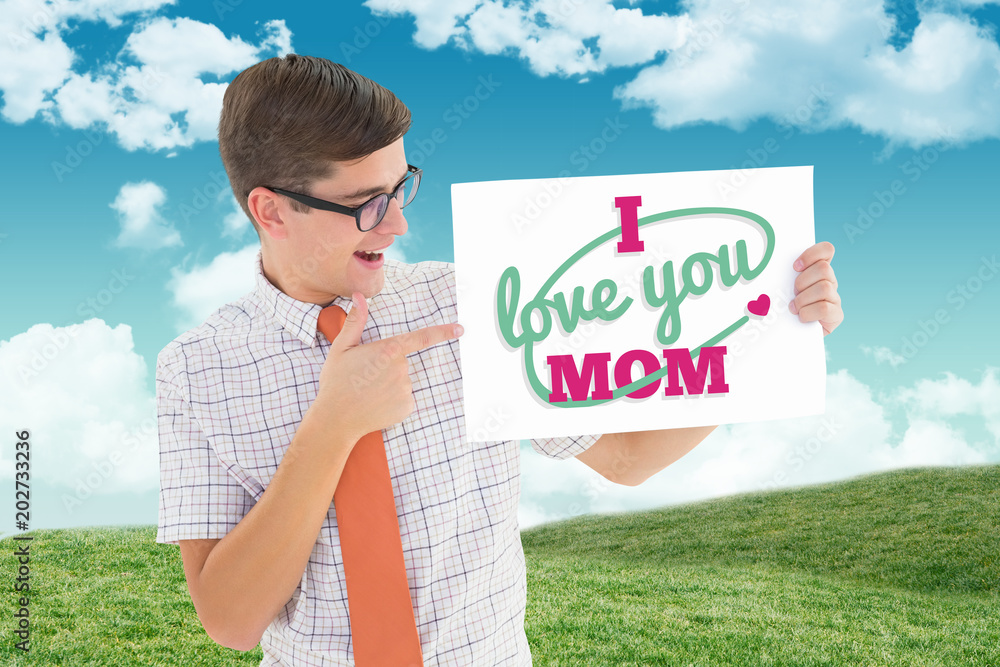 Poster geeky hipster smiling and showing card against field and sky