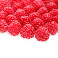 many raspberry berries isolated on white