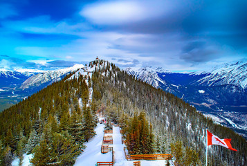 Sulphur Mountain in Banff National Park in the Canadian Rocky Mountains overlooking the town of Banff. - obrazy, fototapety, plakaty