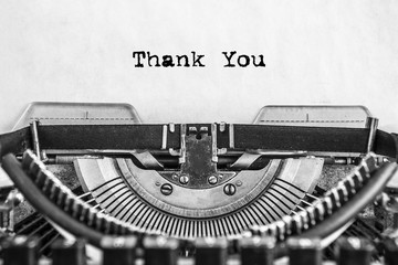 thank you, typed text Vintage typewriter on white background. old paper, close-up