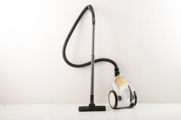 Yellow-white vacuum cleaner white background