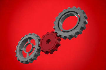 Cogs and wheels against red background