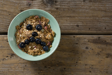Oats with blueberries forming face