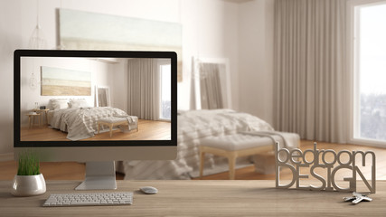 Architect designer project concept, wooden table with keys, 3D letters making the words bedroom design and desktop showing draft, blurred space in the background, interior design