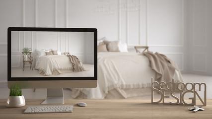 Architect designer project concept, wooden table with keys, 3D letters making the words bedroom design and desktop showing draft, blurred space in the background, interior design