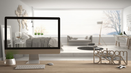 Architect designer project concept, wooden table with keys, 3D letters making the words bedroom design and desktop showing draft, blurred space in the background, interior design