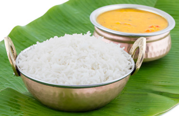 Indian Traditional Cuisine Dal Fry or Rice Also Know as Dal Chawal, Daal Chawal, Dal Rice, Whole Yellow Lentil with Rice or Dal Tadka, Daal Fry Served with Rice isolated on White Background