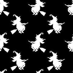 Abstract seamless halloween pattern for girls or boys. Creative vector background with cat, whitch, halloween. Funny pattern for textile and fabric. Fashion halloween style. Colorful bright picture