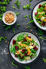 Fresh Beet, Orange salad with wild rocket, cheese and Pine nuts. healthy summer food