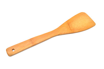 Wooden spoon isolated on white background. Flat lay, top view