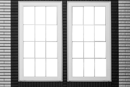 White wood window and brick wall