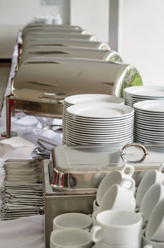 White porcelain dishes in the hotel restaurant