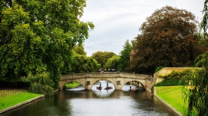 Fototapeta na wymiar Old stones bridge over the river in Cambridge, England 