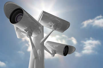 CCTV camera against sky 