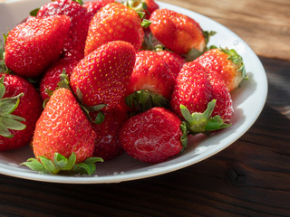 strawberries on a white plate