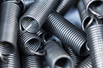 Closeup of shiny galvanized coiled helical springs