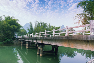 Fototapeta premium road on Dragon bridge over Yulong river in Yangshuo county