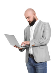 Portrait of confident young businessman with laptop on white background