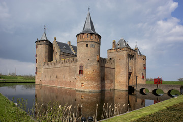 Fototapeta na wymiar The castle Muiderslot in the village Muiden in Holland, the Netherlands, Europe